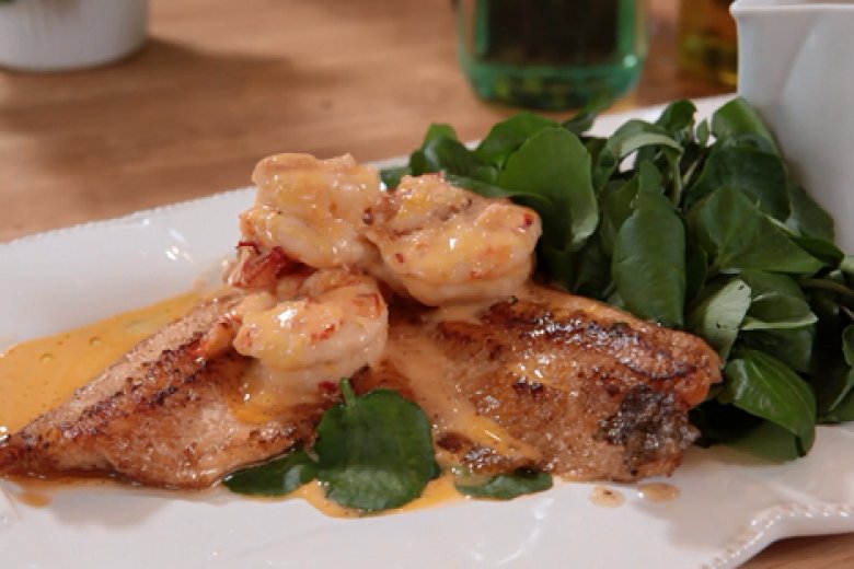 Rainbow trout with creamy prawn sauce and watercress