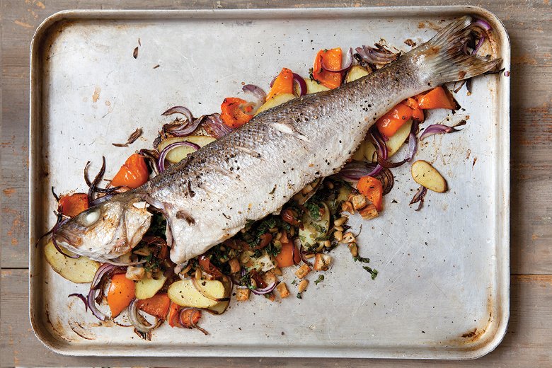 Whole baked fish with sun-dried tomatoes